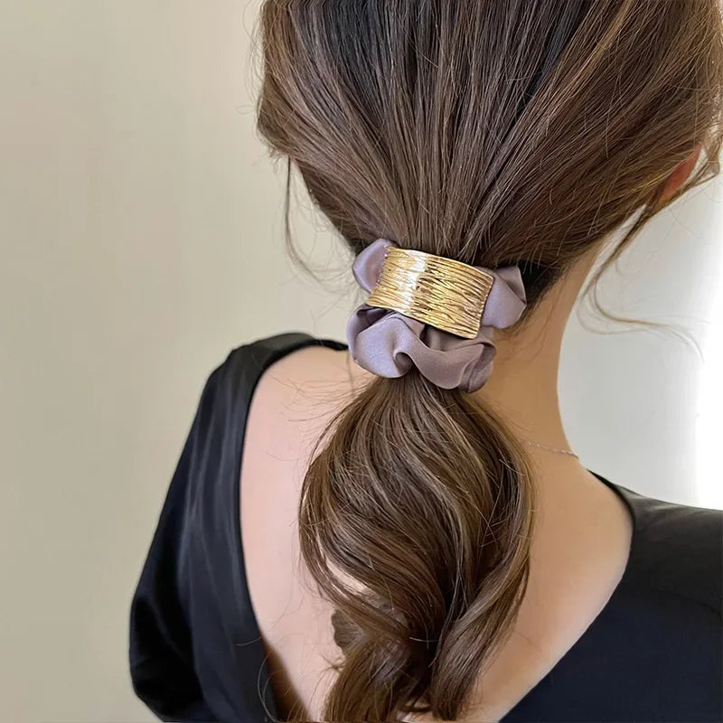 Attache cheveux en Satin métallique