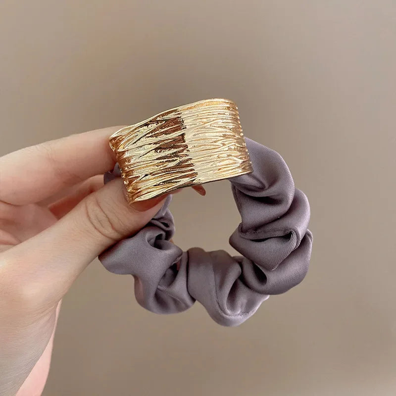 Attache cheveux en Satin métallique